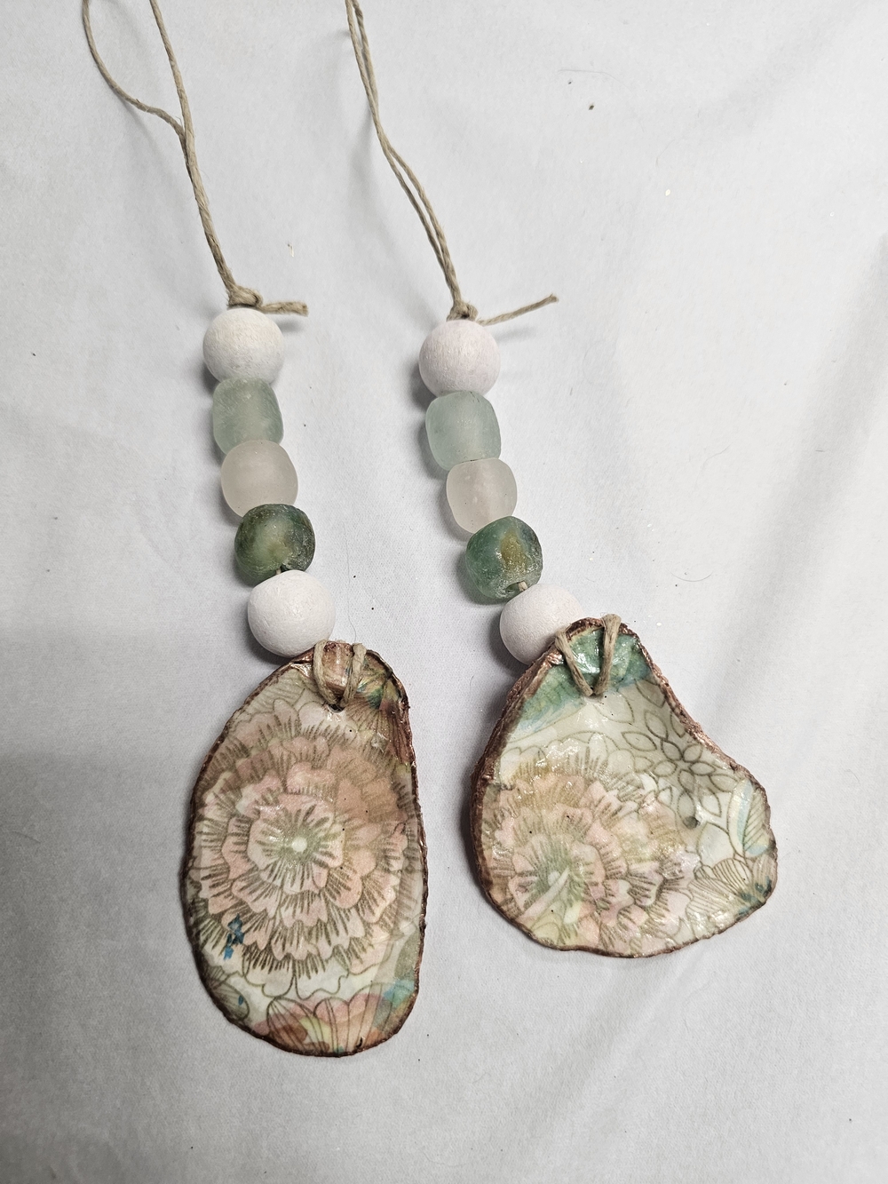 Handcrafted Floral Shell Ornaments in Soft Green and Pink
